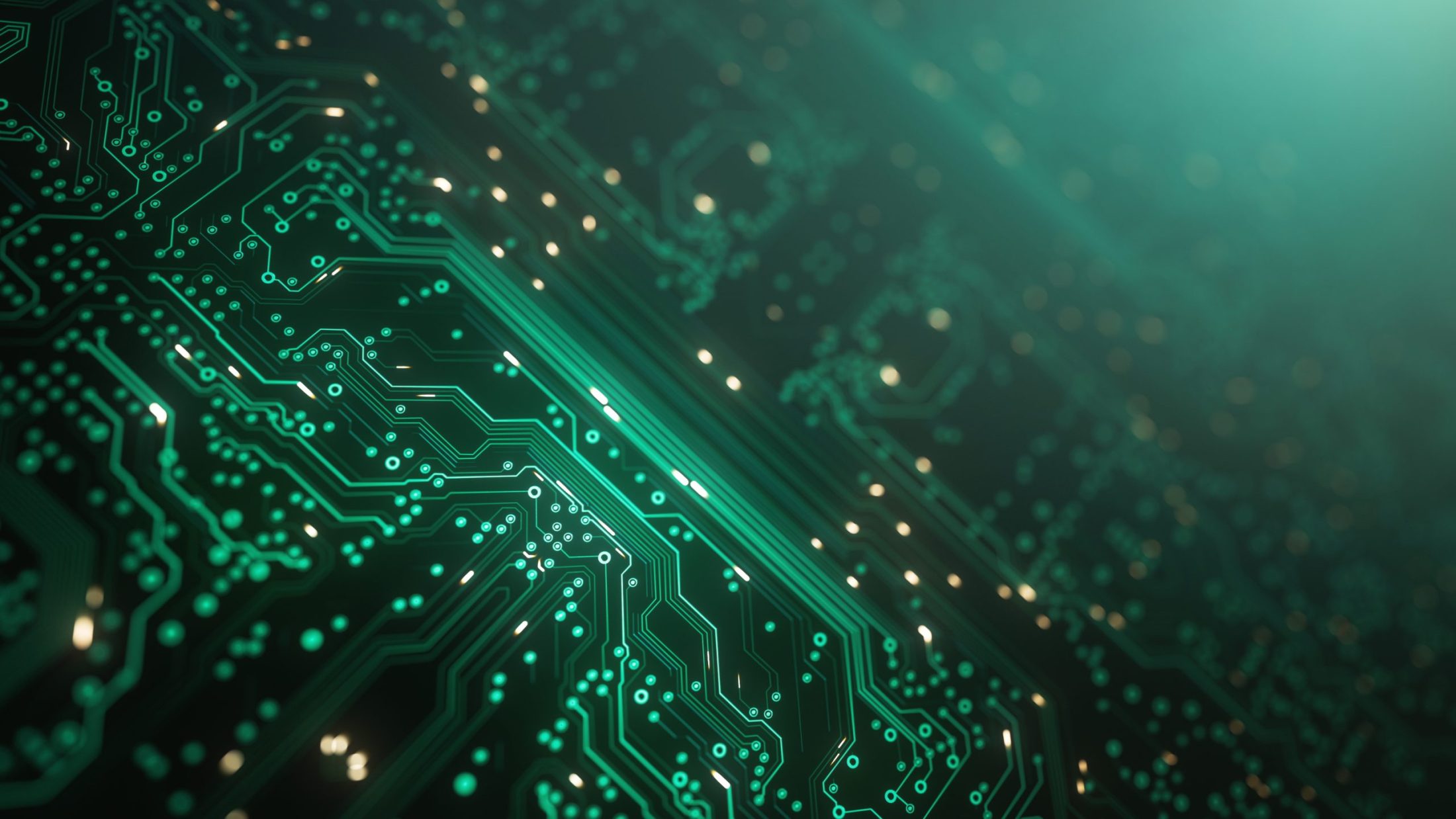 Close-up of a green circuit board with glowing lines and electronic pathways illuminated in a dark setting.